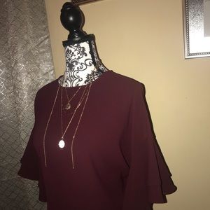 Sleek large ruffle sleeve blouse